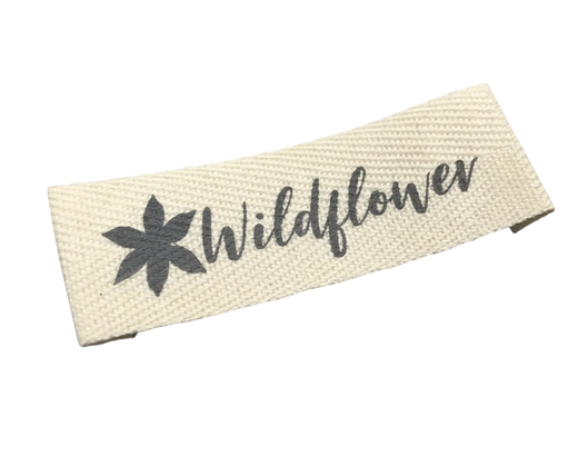 Custom clothing labels - natural cotton fabric tag with Wildflower script text and flower icon