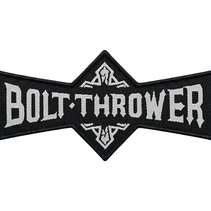Black and white woven patch with the Bolt Thrower band logo, showing the name “BOLT·THROWER” in bold white lettering with ornamental motifs above and below the center.