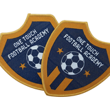 One Touch Football Academy shield-shaped woven patch with soccer ball and star design in navy and gold