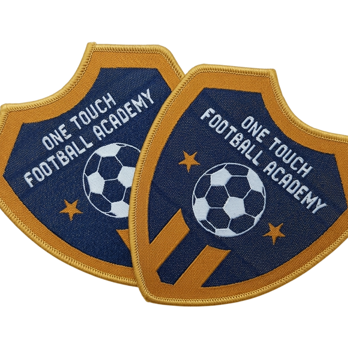 One Touch Football Academy shield-shaped woven patch with soccer ball and star design in navy and gold