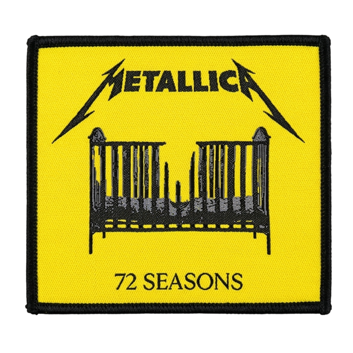 Yellow and black woven patch of Metallica’s “72 Seasons” album art, showing the band logo above a black baby crib with a broken middle.
