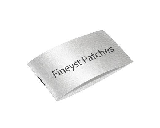 Printed woven labels sample - folded satin fabric tag with Fineyst Patches text