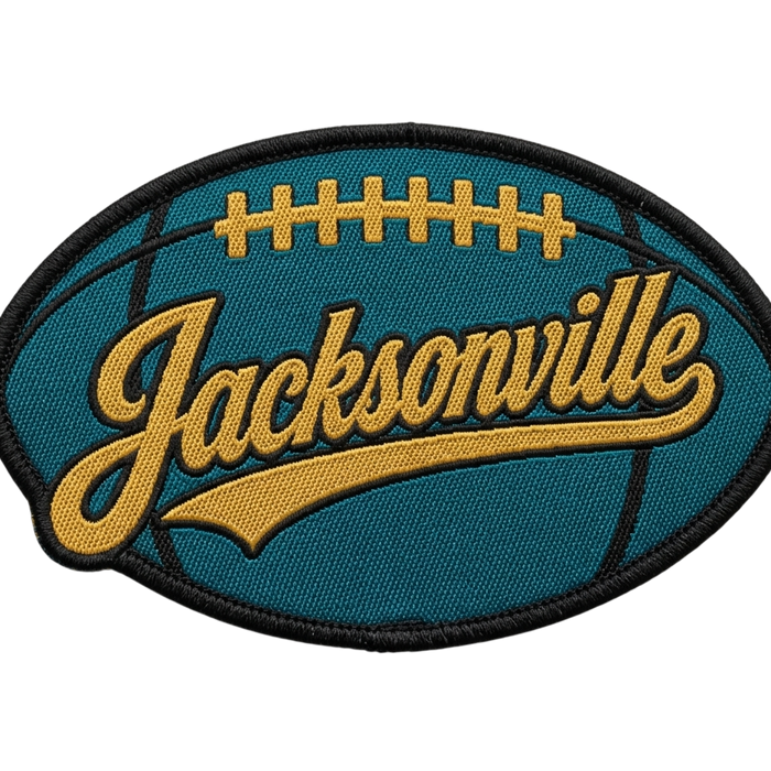 Jacksonville football woven patch with script lettering on teal oval football design