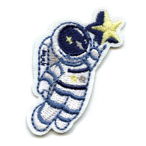 Small Blue Astronaut Holding A Star Patch