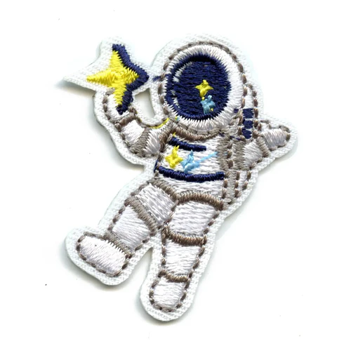 Small Grey Astronaut Holding A Star Patch